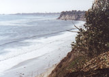 Ocean lapping at the base of cliffs